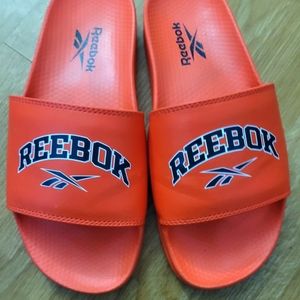 Reebok Orange. size 7 Slides/Sandals